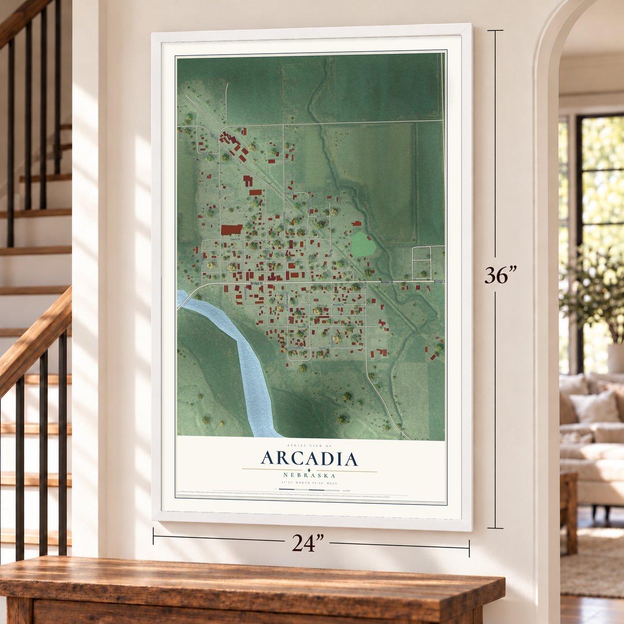 Arcadia, Nebraska map, 24 x 36 inch print in a white frame by a staircase