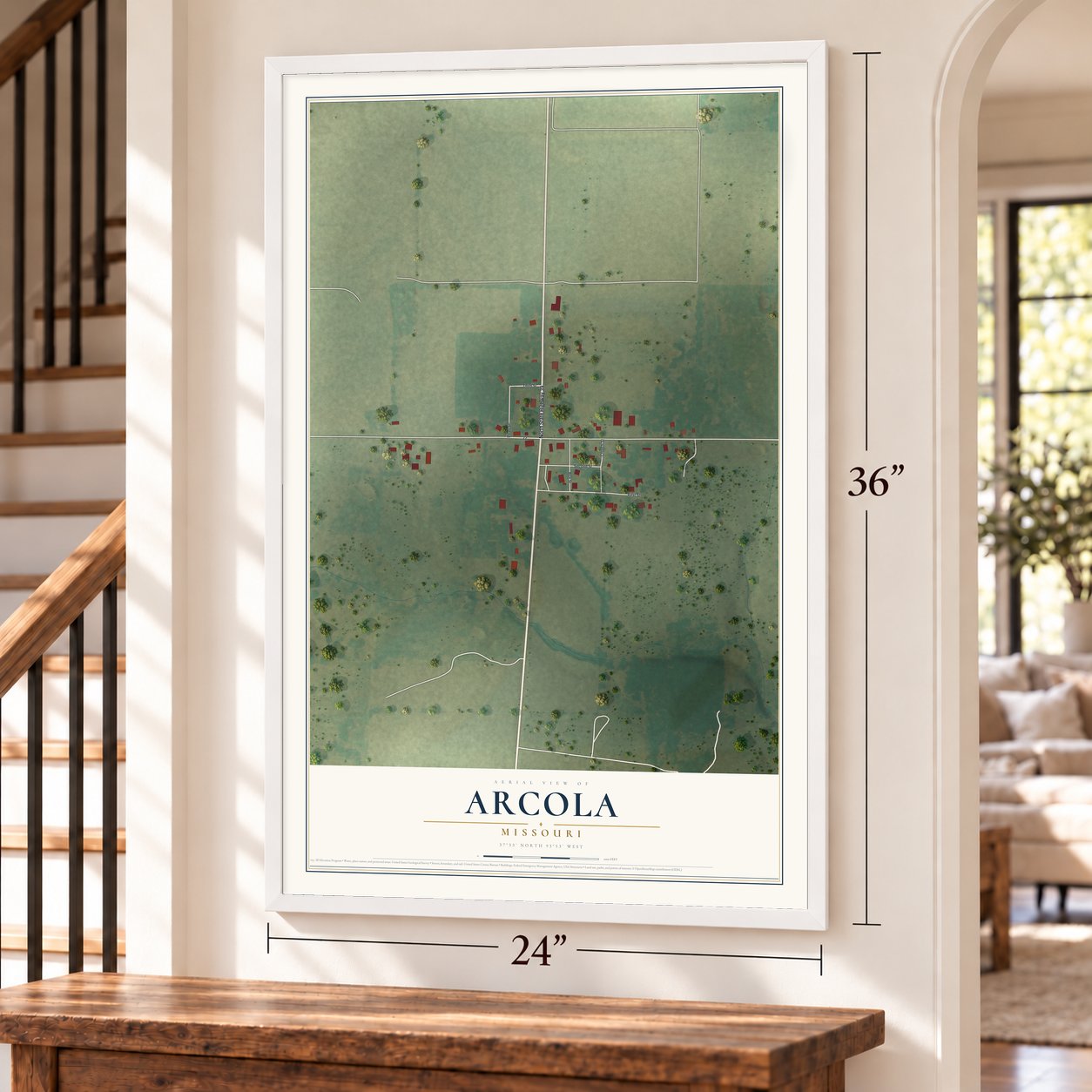 Arcola, Missouri map, 24 x 36 inch print in a white frame by a staircase