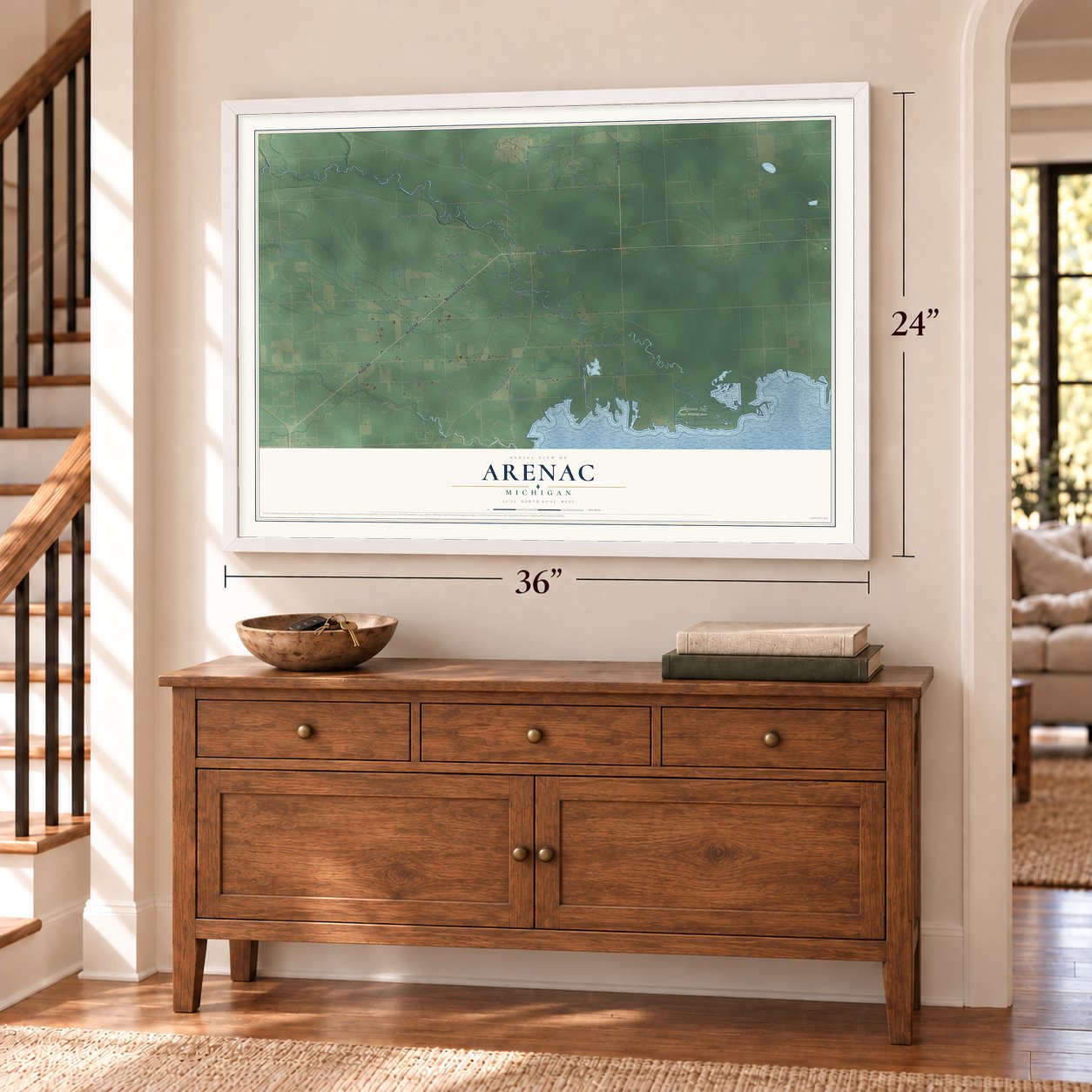 Arenac, Michigan map, 24 x 36 inch print in a white frame above a dresser by a staircase