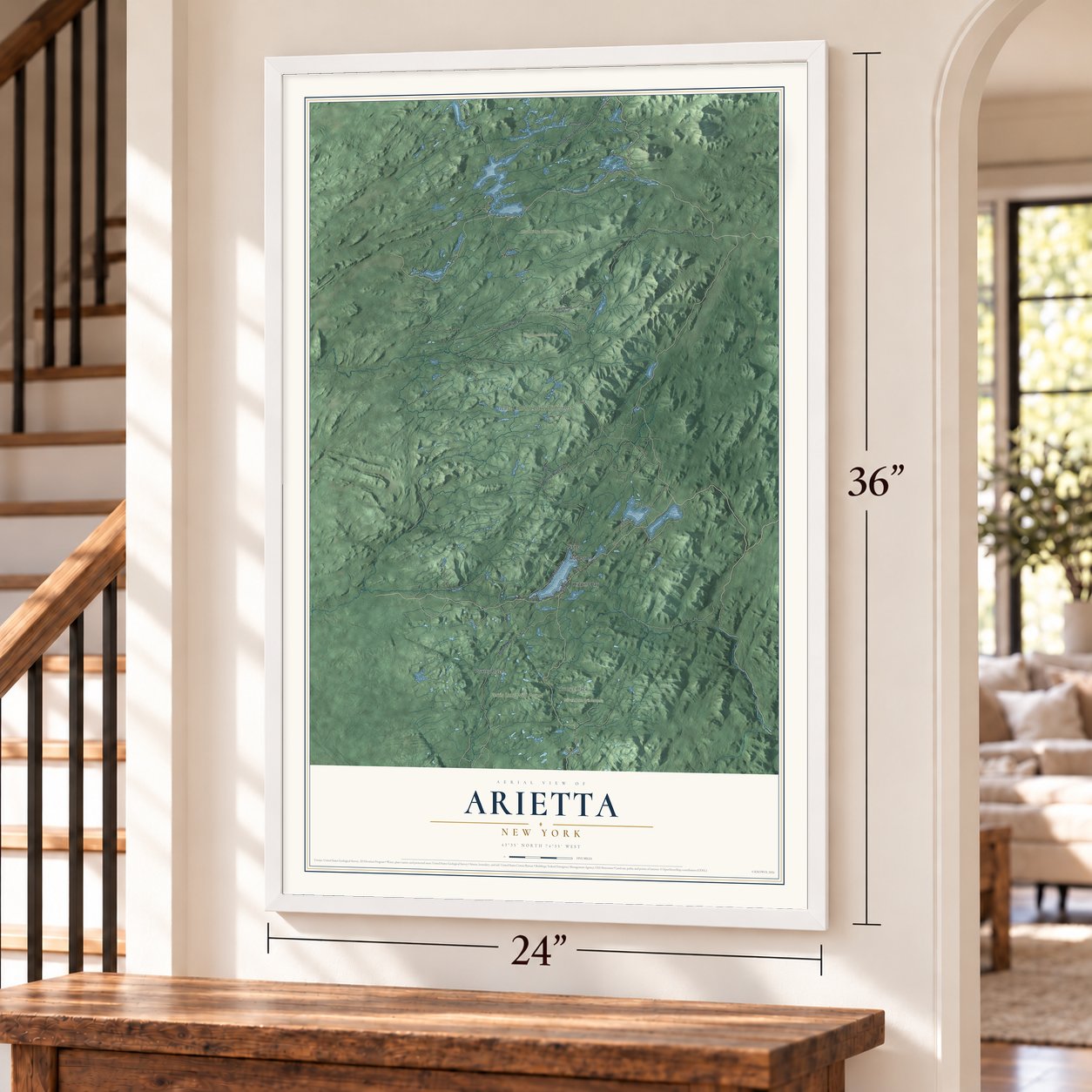 Arietta, New York map, 24 x 36 inch print in a white frame by a staircase