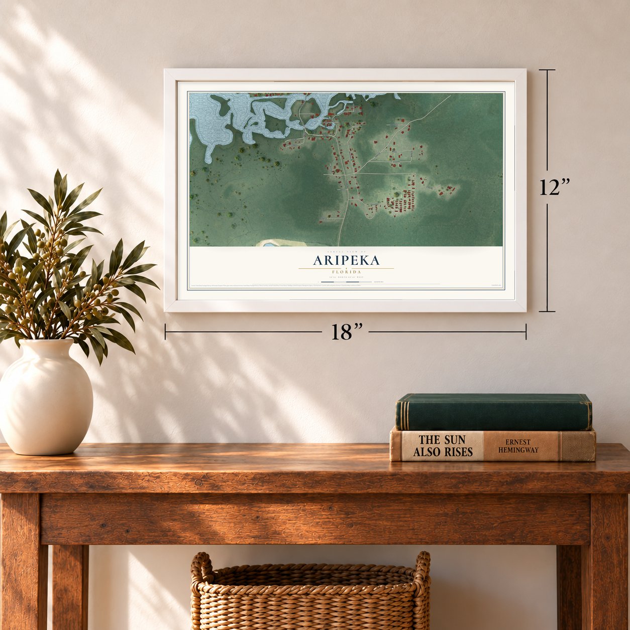 Aripeka, Florida map, 12 x 18 inch print in a white frame in an entryway