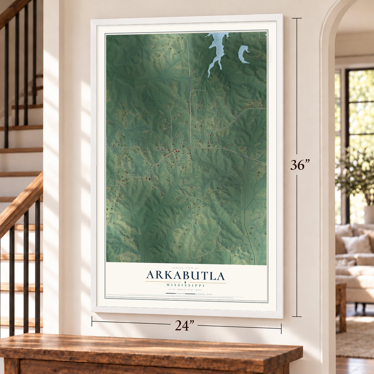 Arkabutla, Mississippi map, 24 x 36 inch print in a white frame by a staircase