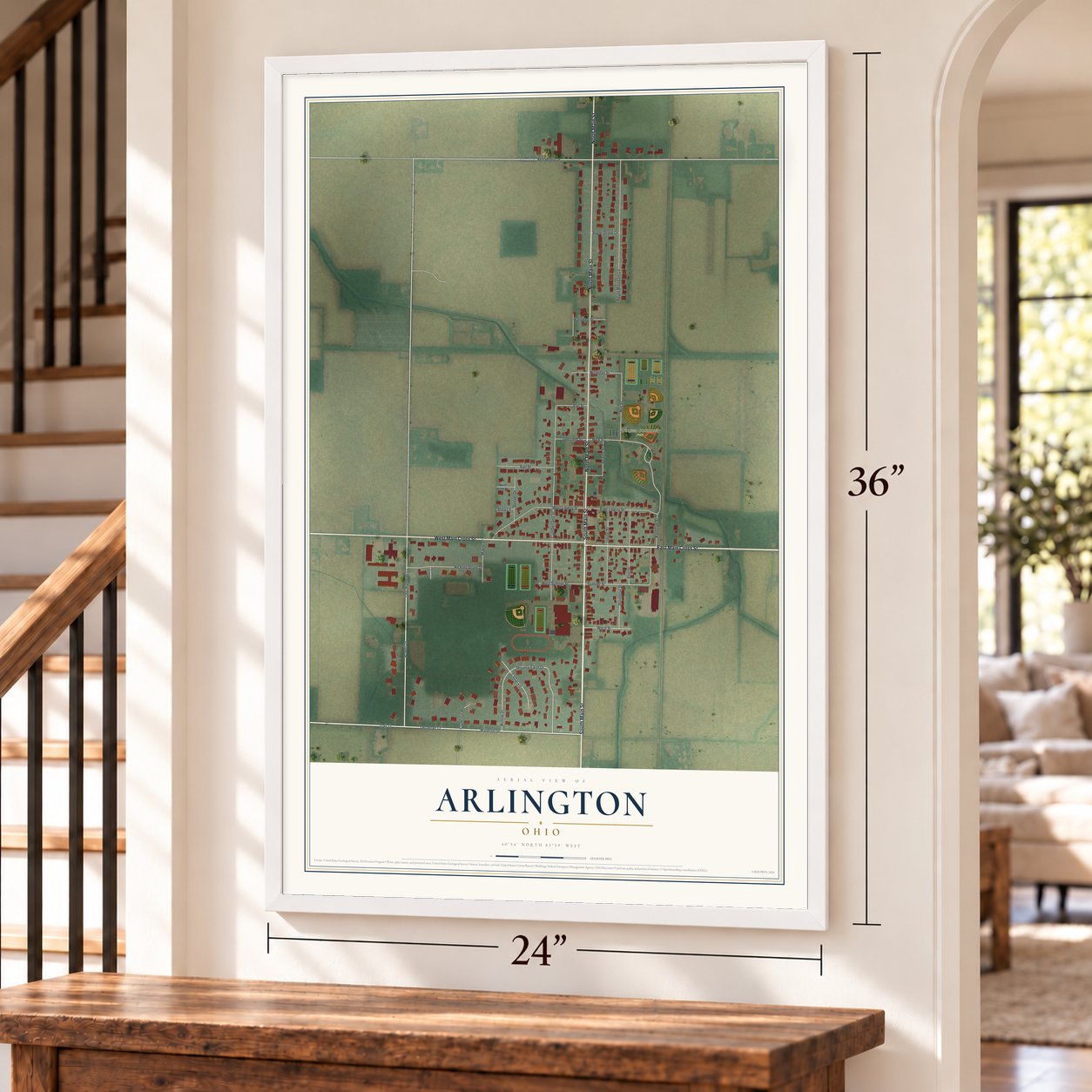 Arlington, Ohio map, 24 x 36 inch print in a white frame by a staircase