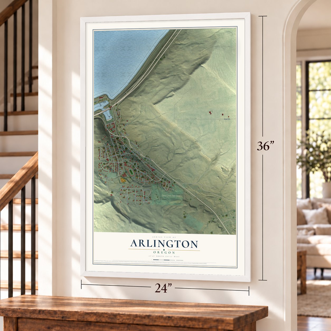 Arlington, Oregon map, 24 x 36 inch print in a white frame by a staircase