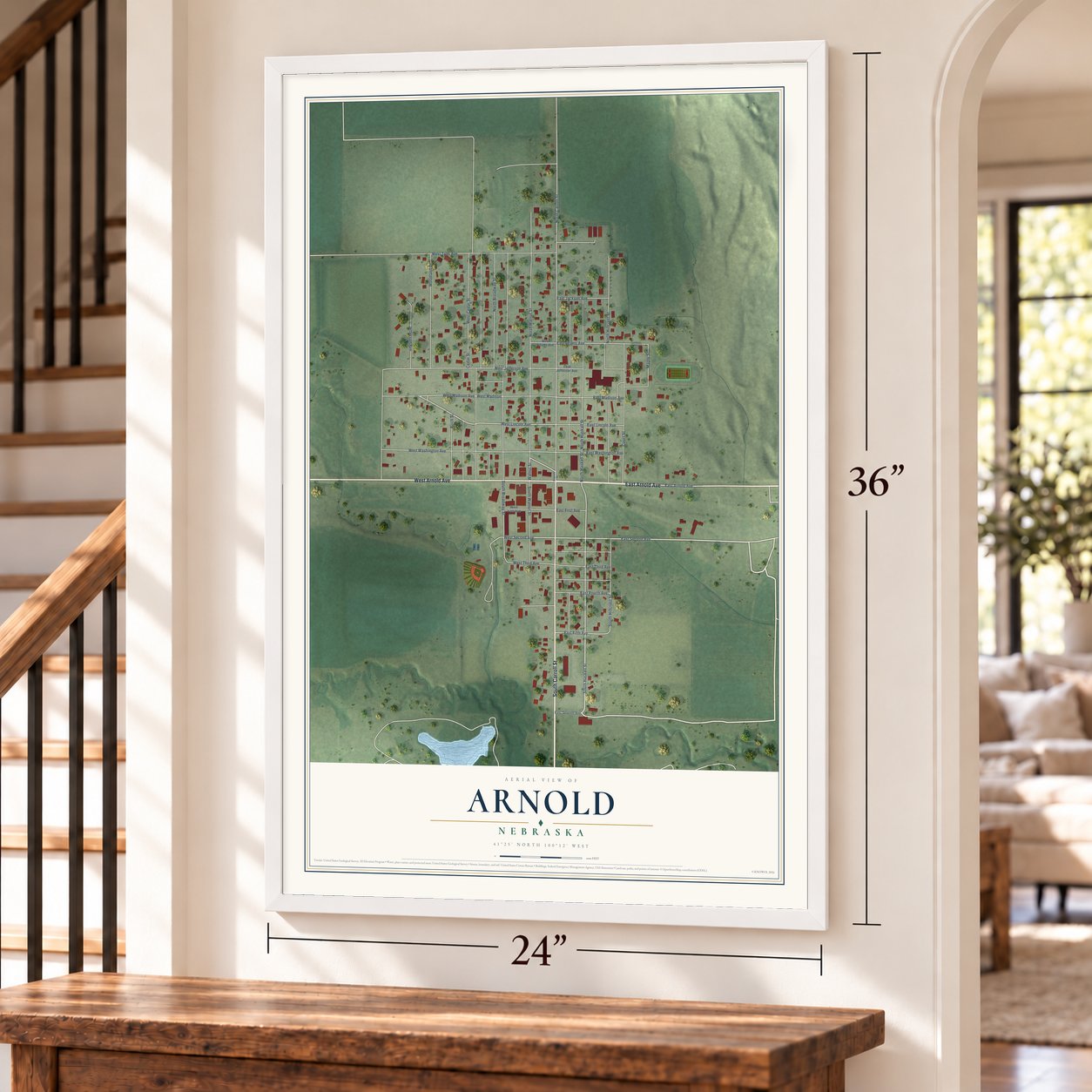 Arnold, Nebraska map, 24 x 36 inch print in a white frame by a staircase