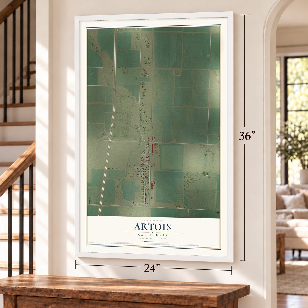 Artois, California map, 24 x 36 inch print in a white frame by a staircase