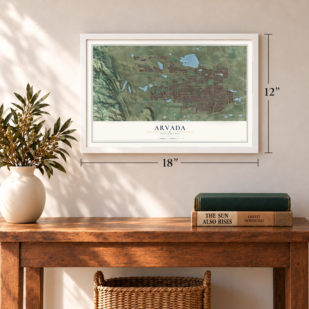 Arvada, Colorado map, 12 x 18 inch print in a white frame in an entryway