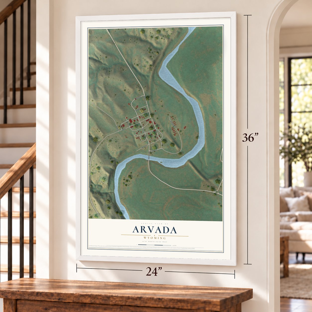 Arvada, Wyoming map, 24 x 36 inch print in a white frame by a staircase