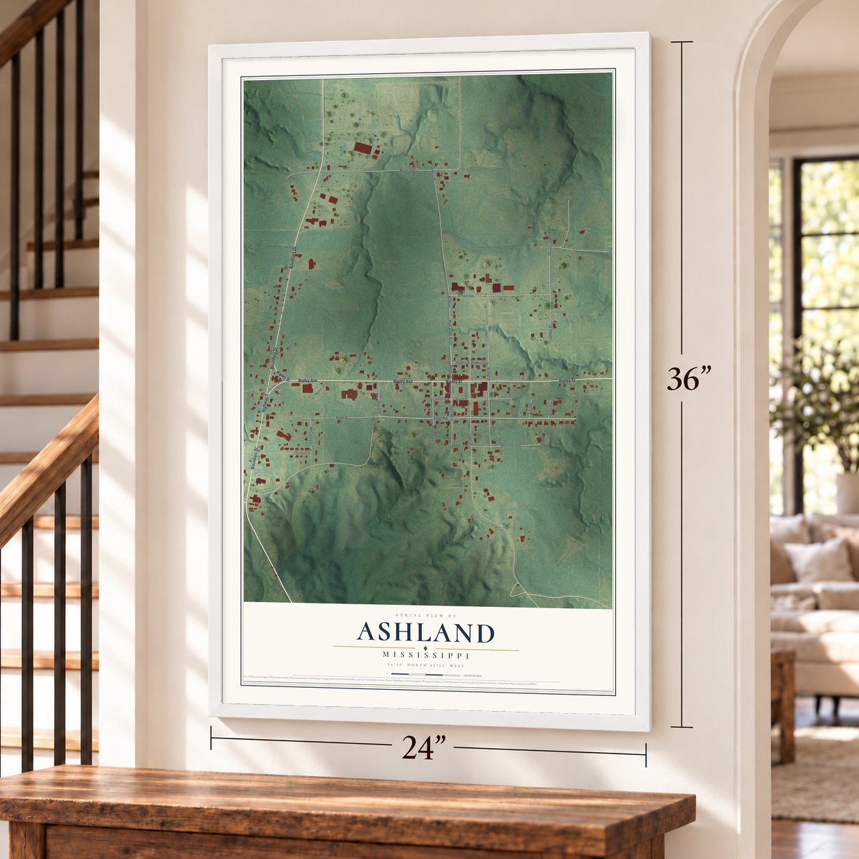 Ashland, Mississippi map, 24 x 36 inch print in a white frame by a staircase