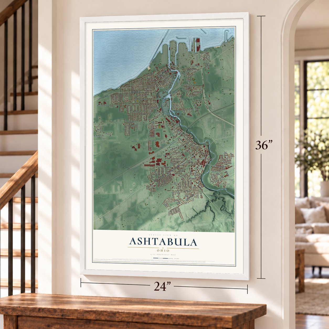 Ashtabula, Ohio map, 24 x 36 inch print in a white frame by a staircase