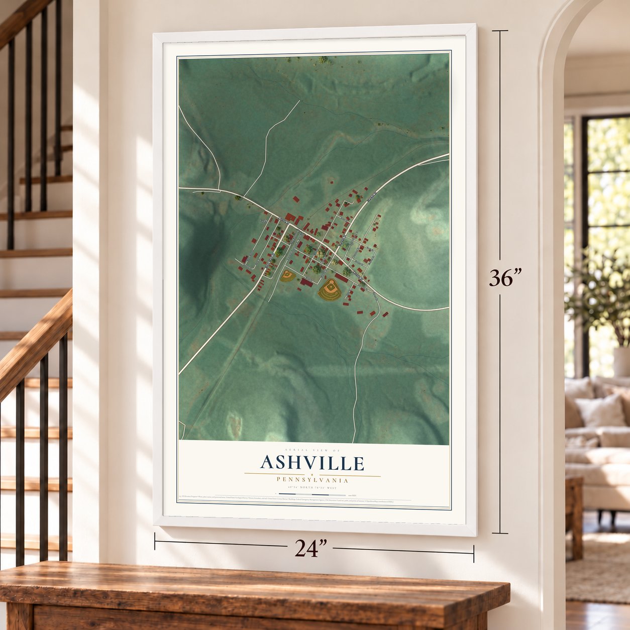 Ashville, Pennsylvania map, 24 x 36 inch print in a white frame by a staircase