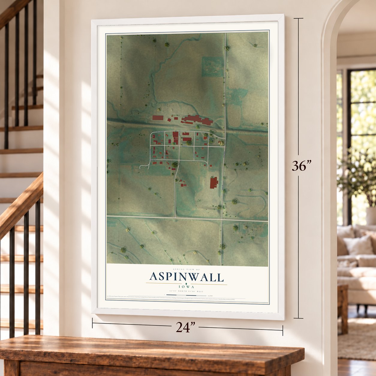 Aspinwall, Iowa map, 24 x 36 inch print in a white frame by a staircase