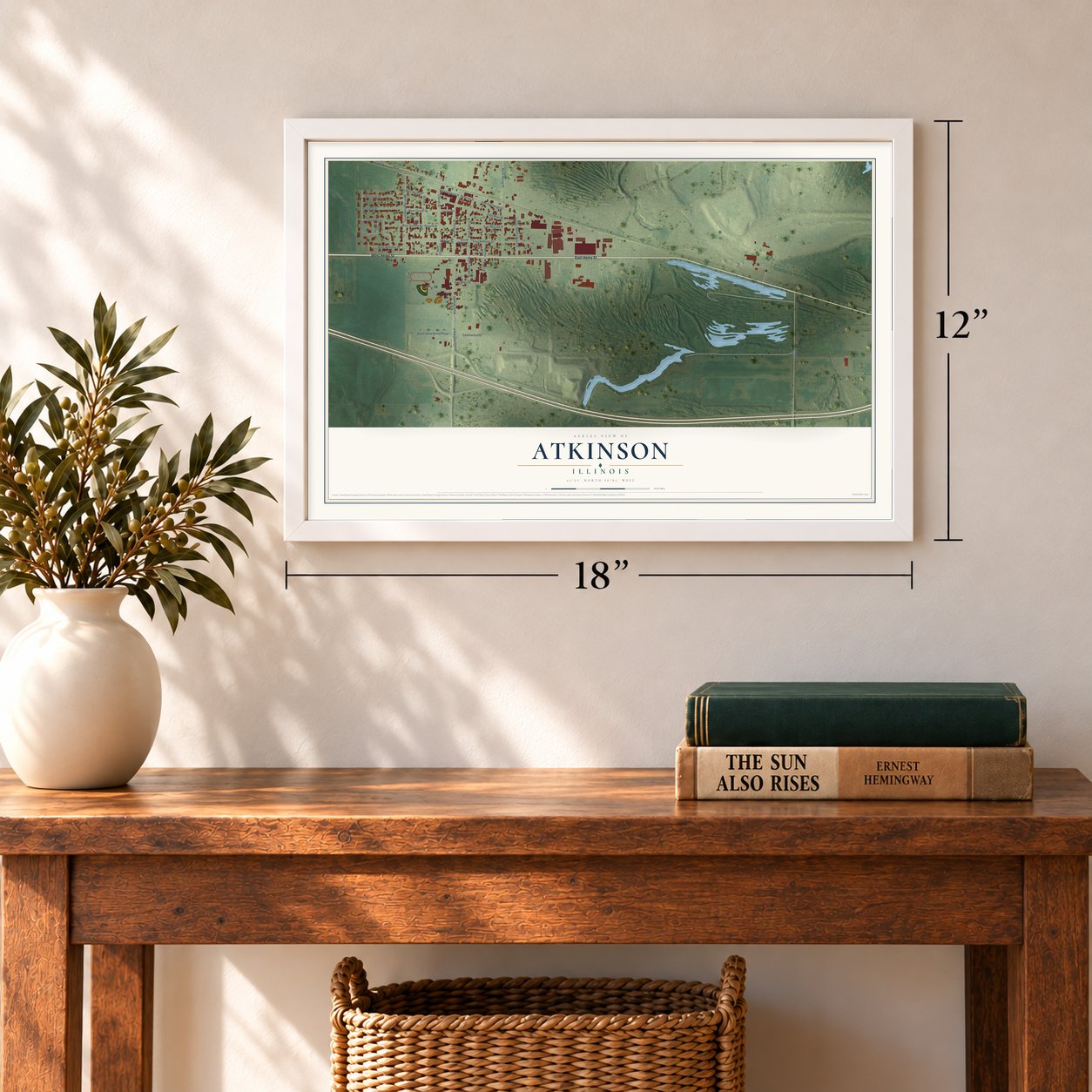 Atkinson, Illinois map, 12 x 18 inch print in a white frame in an entryway