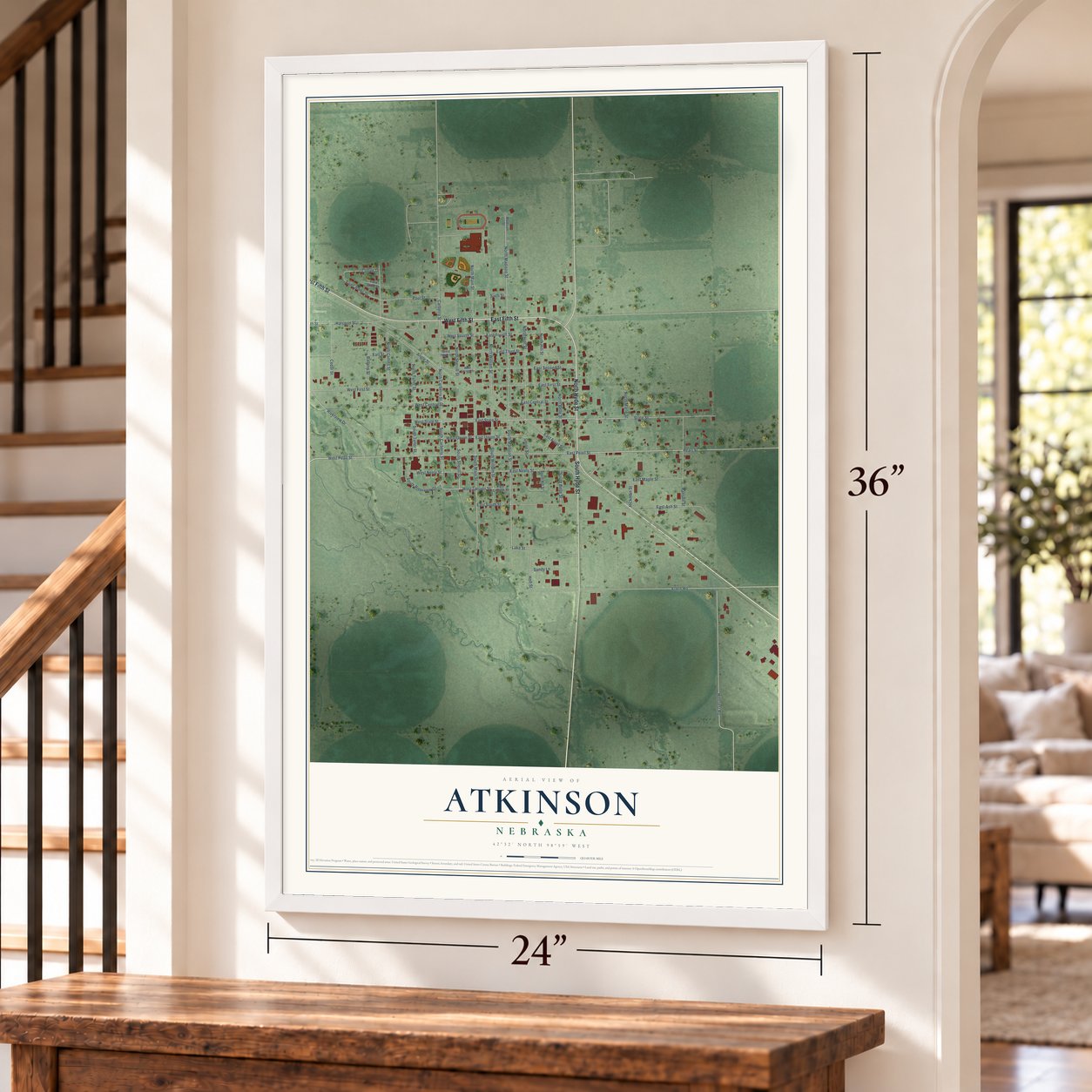 Atkinson, Nebraska map, 24 x 36 inch print in a white frame by a staircase
