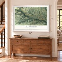 Atlantic City, Wyoming map, 24 x 36 inch print in a white frame above a dresser by a staircase