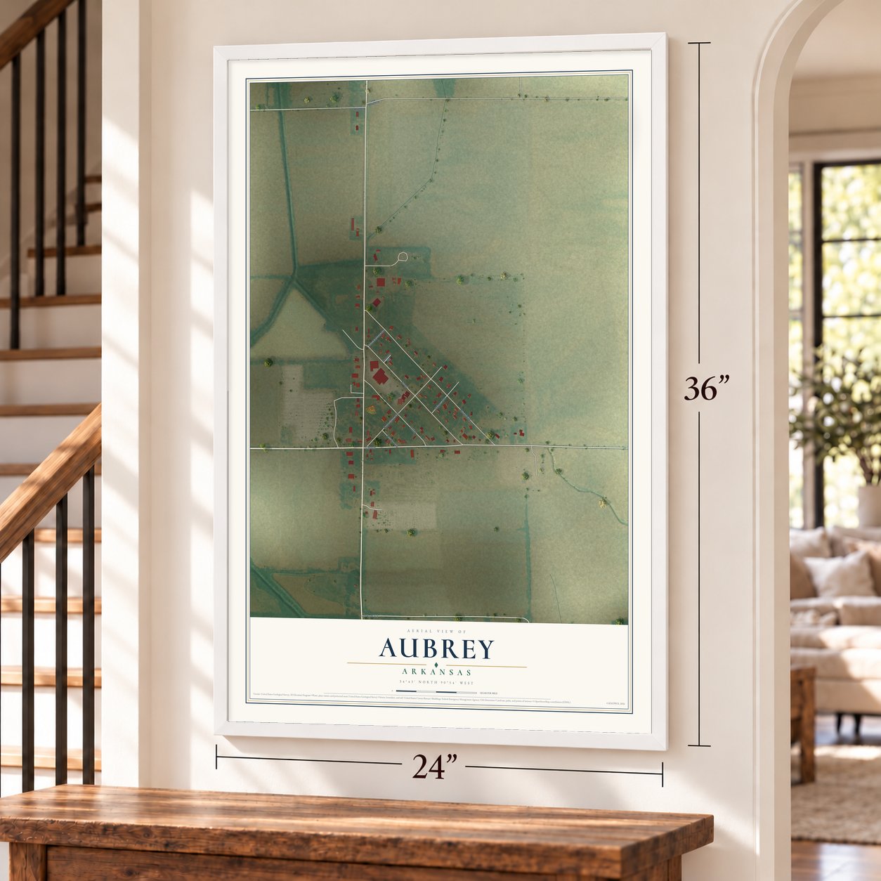 Aubrey, Arkansas map, 24 x 36 inch print in a white frame by a staircase
