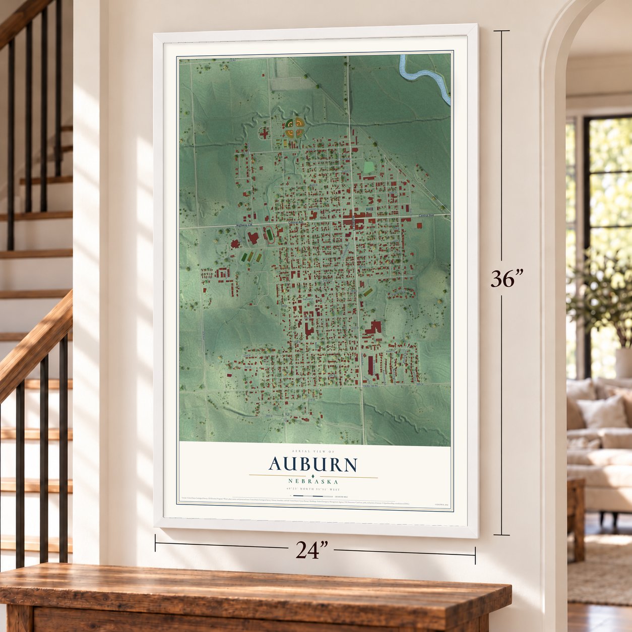 Auburn, Nebraska map, 24 x 36 inch print in a white frame by a staircase