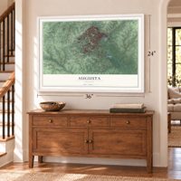 Augusta, Georgia map, 24 x 36 inch print in a white frame above a dresser by a staircase