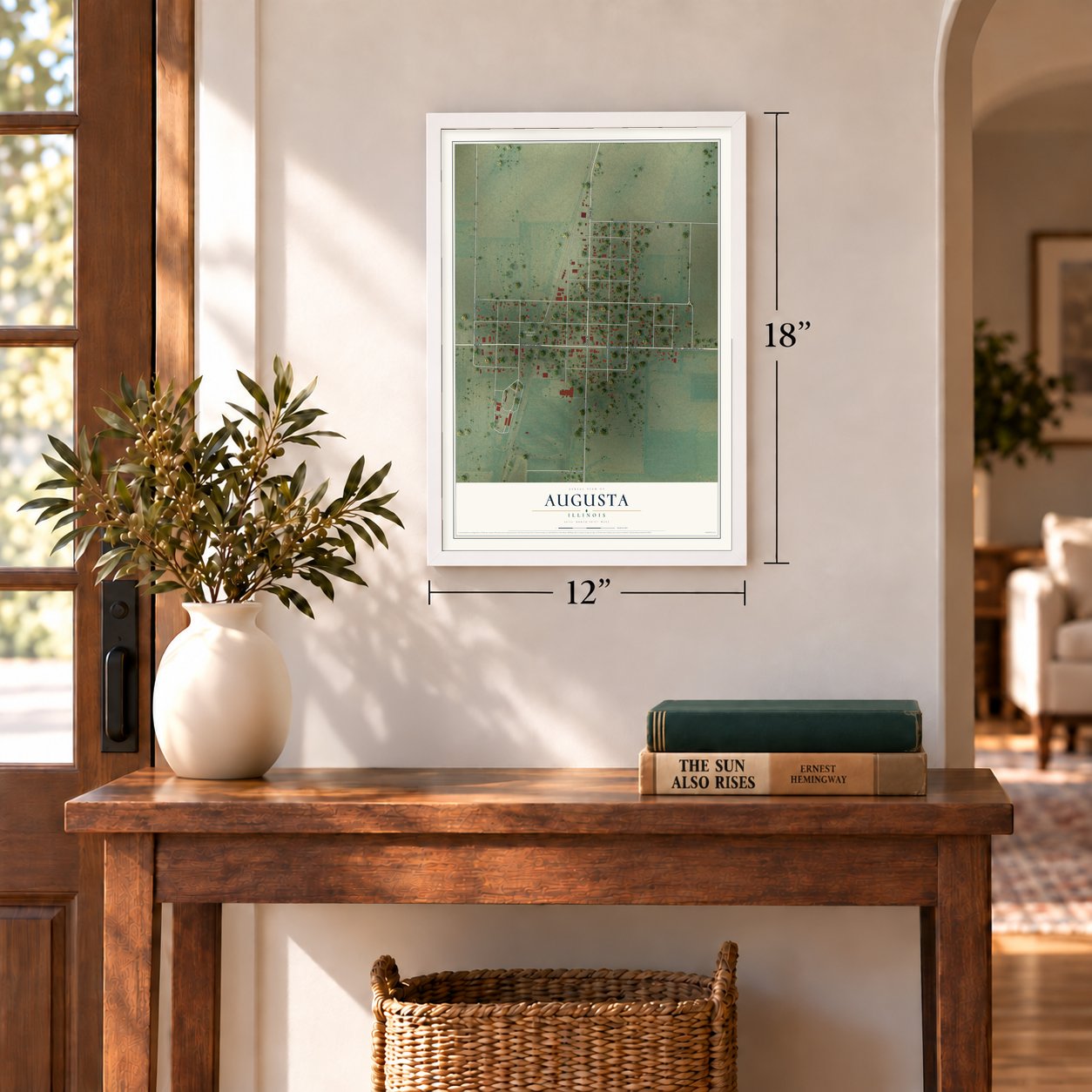 Augusta, Illinois map, 12 x 18 inch print in a white frame in an entryway