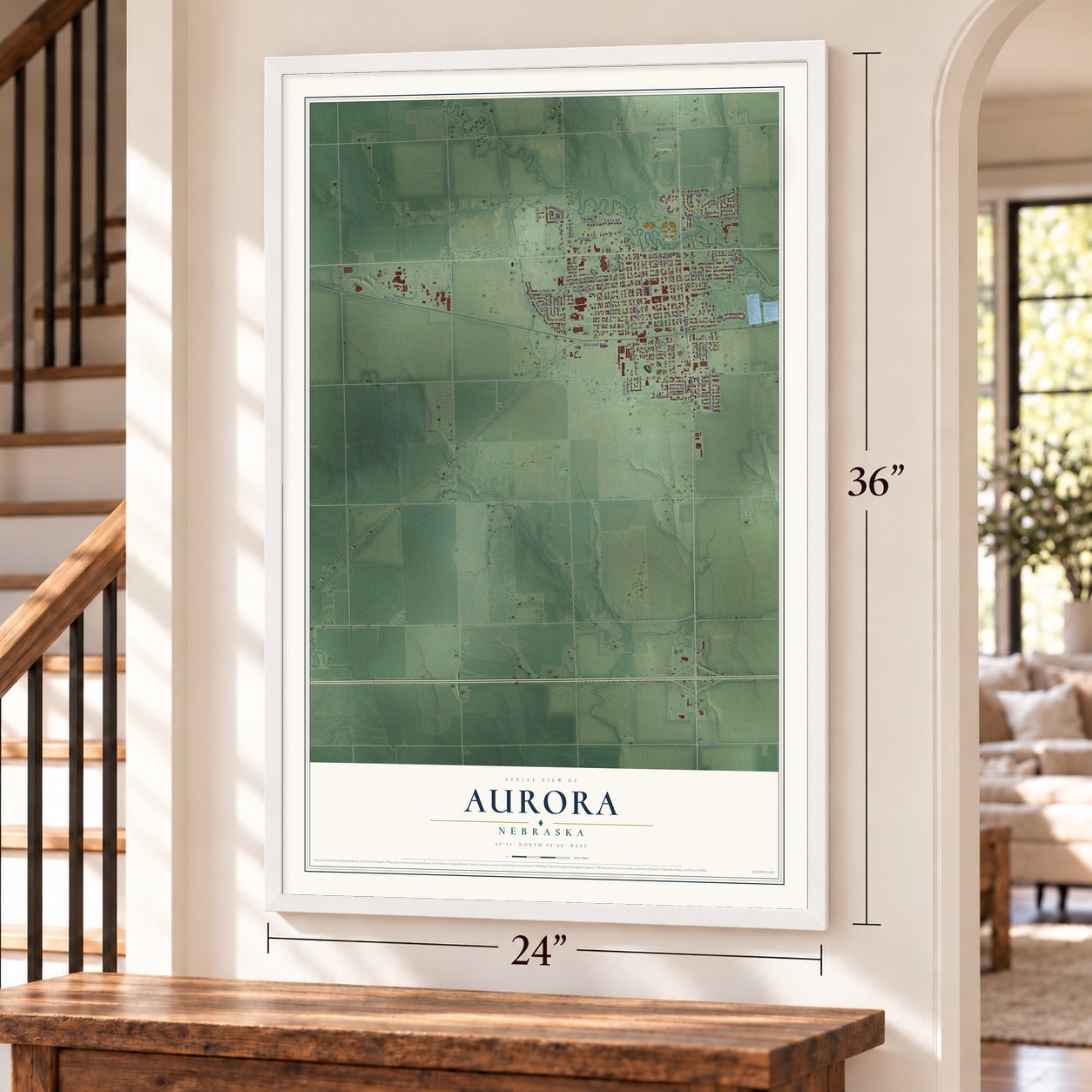 Aurora, Nebraska map, 24 x 36 inch print in a white frame by a staircase