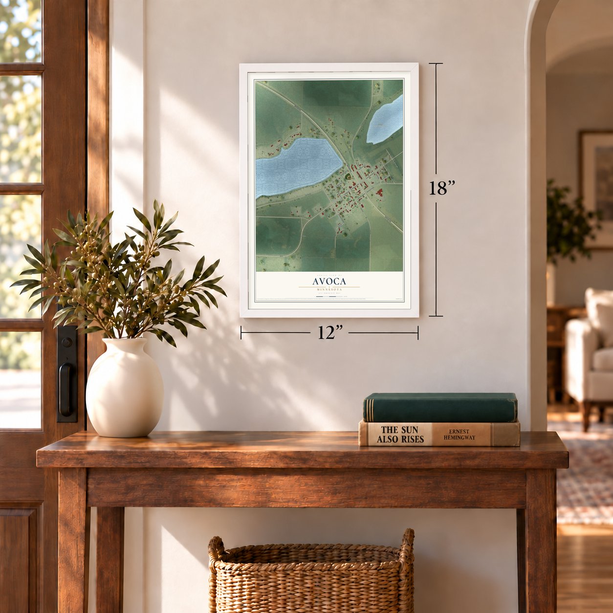 Avoca, Minnesota map, 12 x 18 inch print in a white frame in an entryway