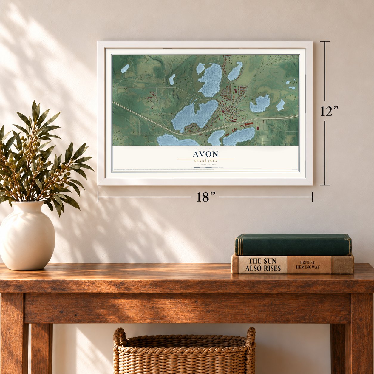 Avon, Minnesota map, 12 x 18 inch print in a white frame in an entryway