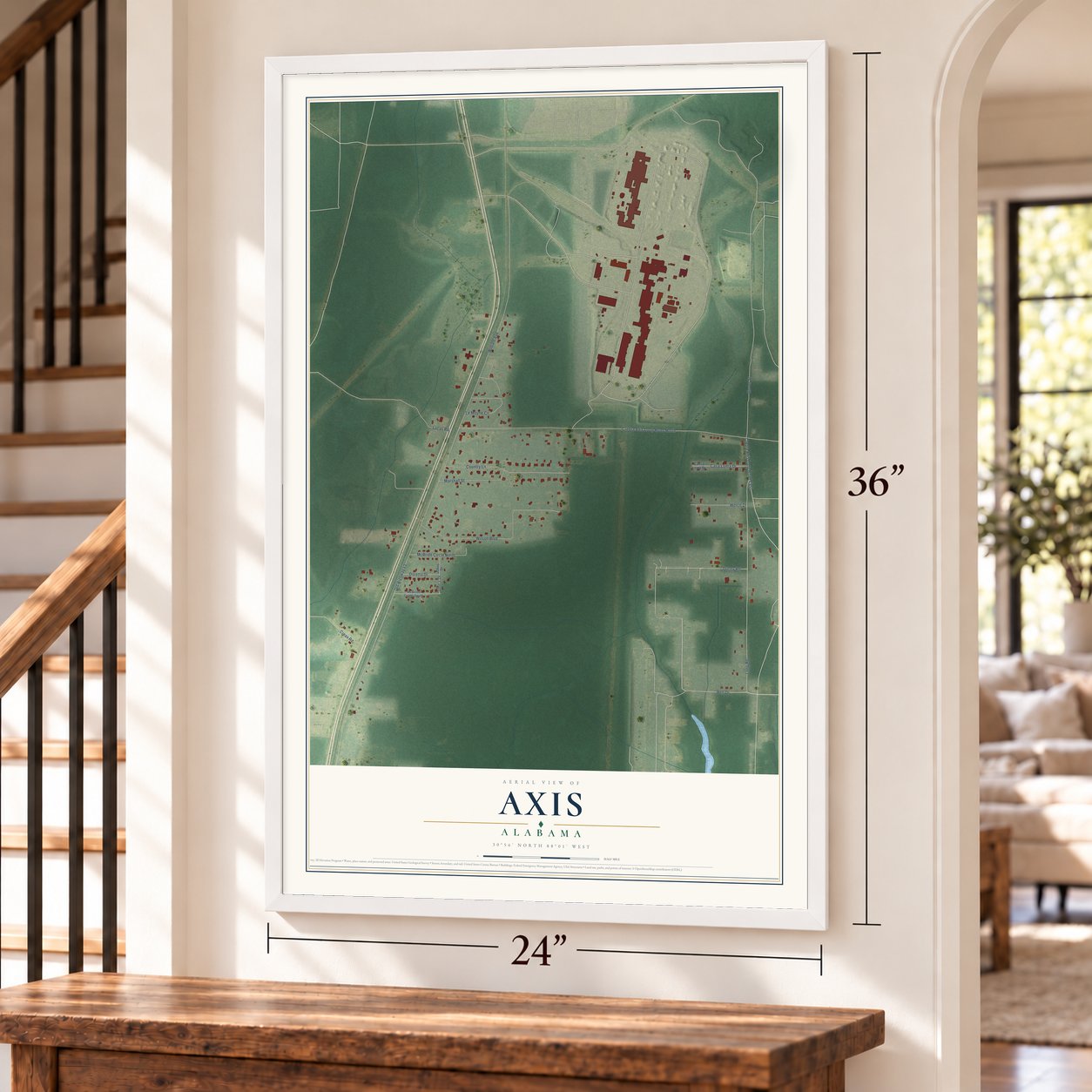 Axis, Alabama map, 24 x 36 inch print in a white frame by a staircase