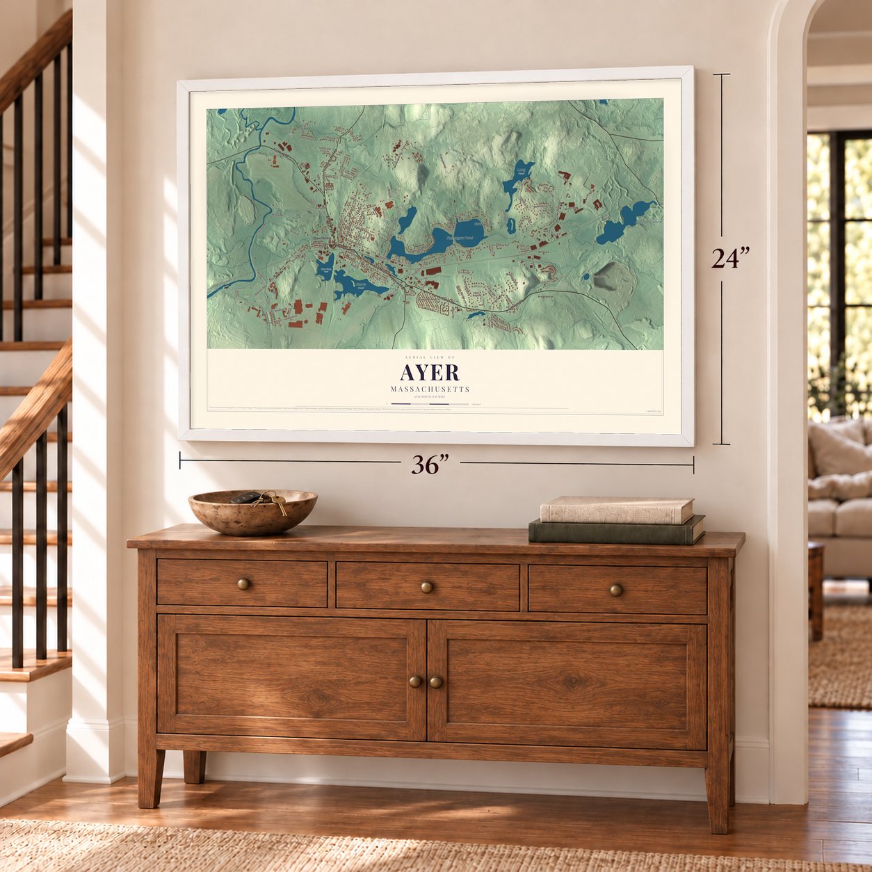 Ayer, Massachusetts map, 24 x 36 inch print in a white frame above a dresser by a staircase