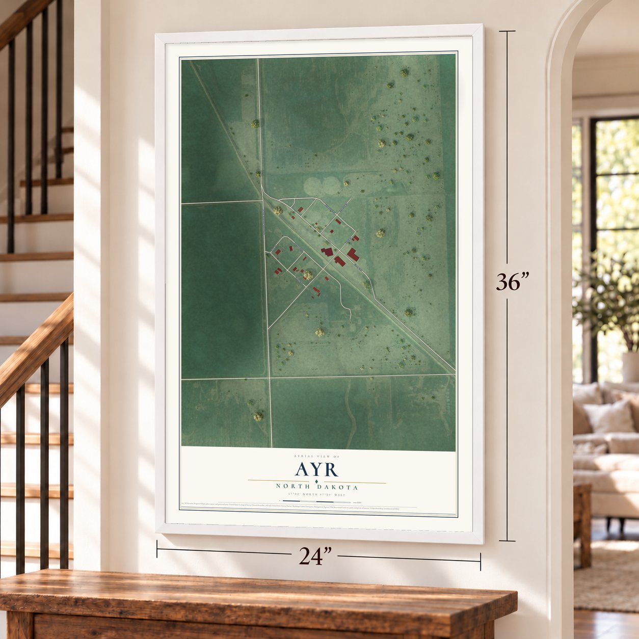 Ayr, North Dakota map, 24 x 36 inch print in a white frame by a staircase