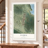 B and E, Texas map, 24 x 36 inch print in a white frame by a staircase