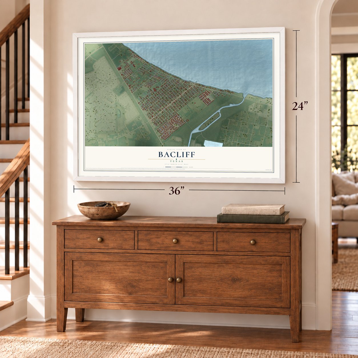 Bacliff, Texas map, 24 x 36 inch print in a white frame above a dresser by a staircase