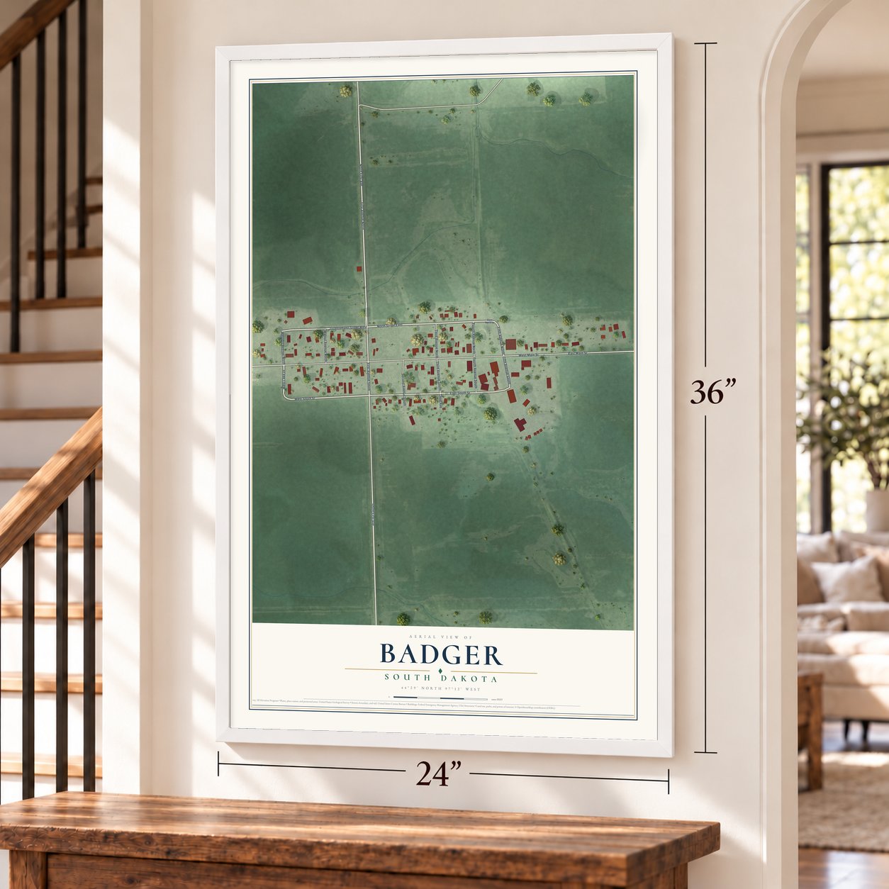 Badger, South Dakota map, 24 x 36 inch print in a white frame by a staircase