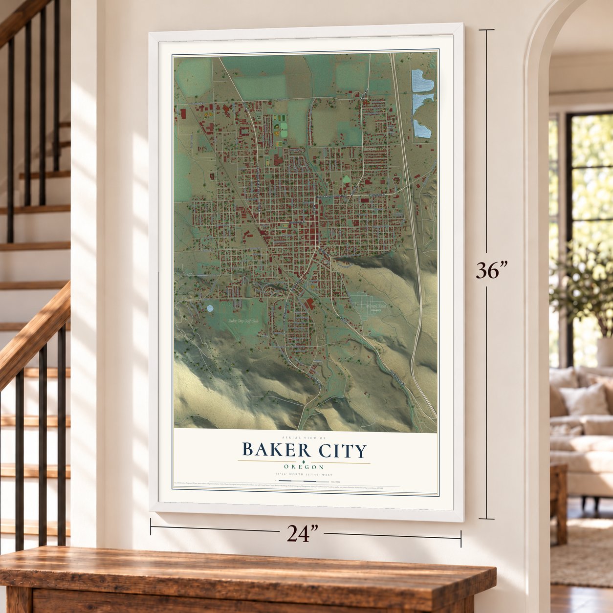 Baker City, Oregon map, 24 x 36 inch print in a white frame by a staircase