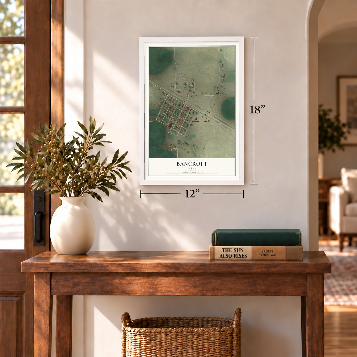 Bancroft, Idaho map, 12 x 18 inch print in a white frame in an entryway