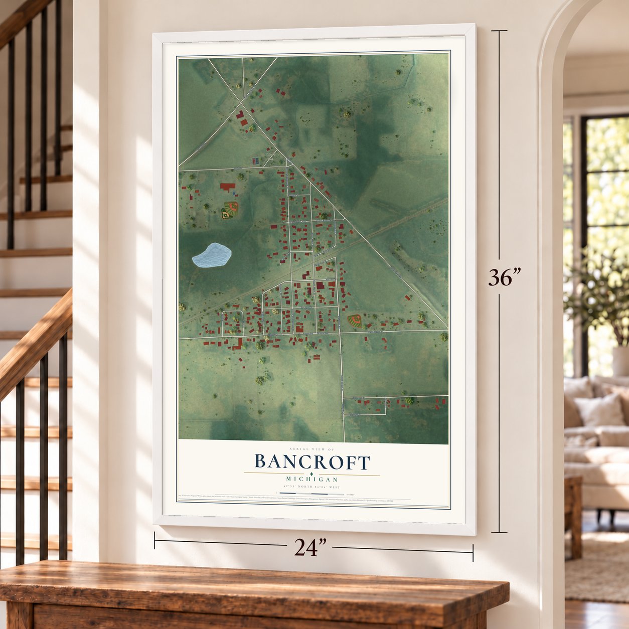 Bancroft, Michigan map, 24 x 36 inch print in a white frame by a staircase