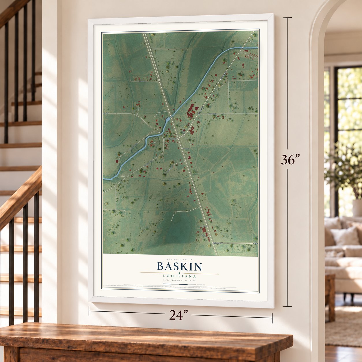 Baskin, Louisiana map, 24 x 36 inch print in a white frame by a staircase