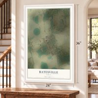 Batesville, Texas map, 24 x 36 inch print in a white frame by a staircase