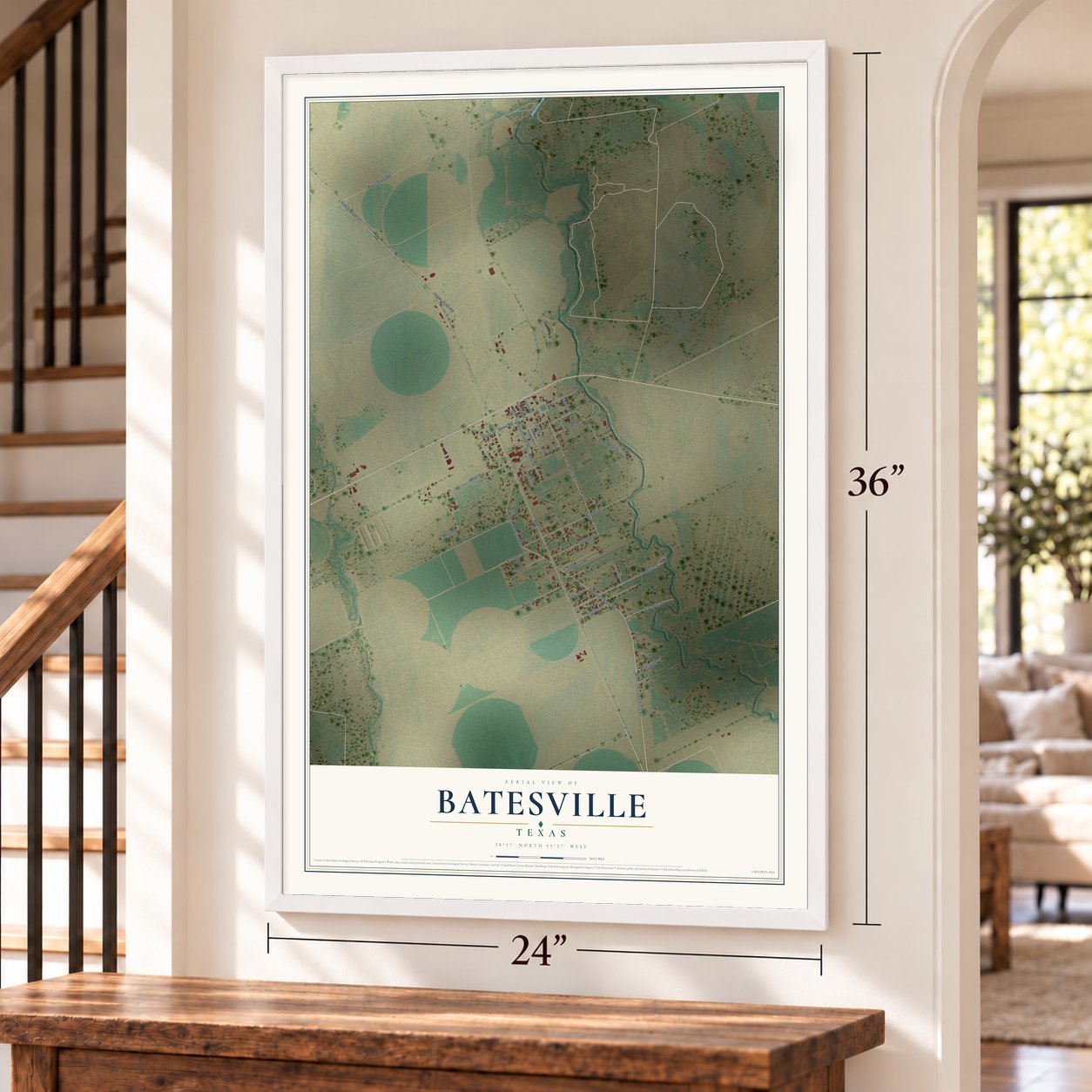 Batesville, Texas map, 24 x 36 inch print in a white frame by a staircase