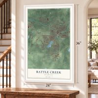 Battle Creek, Michigan map, 24 x 36 inch print in a white frame by a staircase