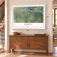 Baudette, Minnesota map, 24 x 36 inch print in a white frame above a dresser by a staircase