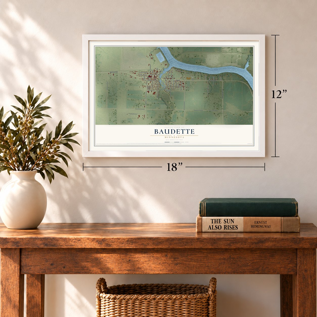 Baudette, Minnesota map, 12 x 18 inch print in a white frame in an entryway