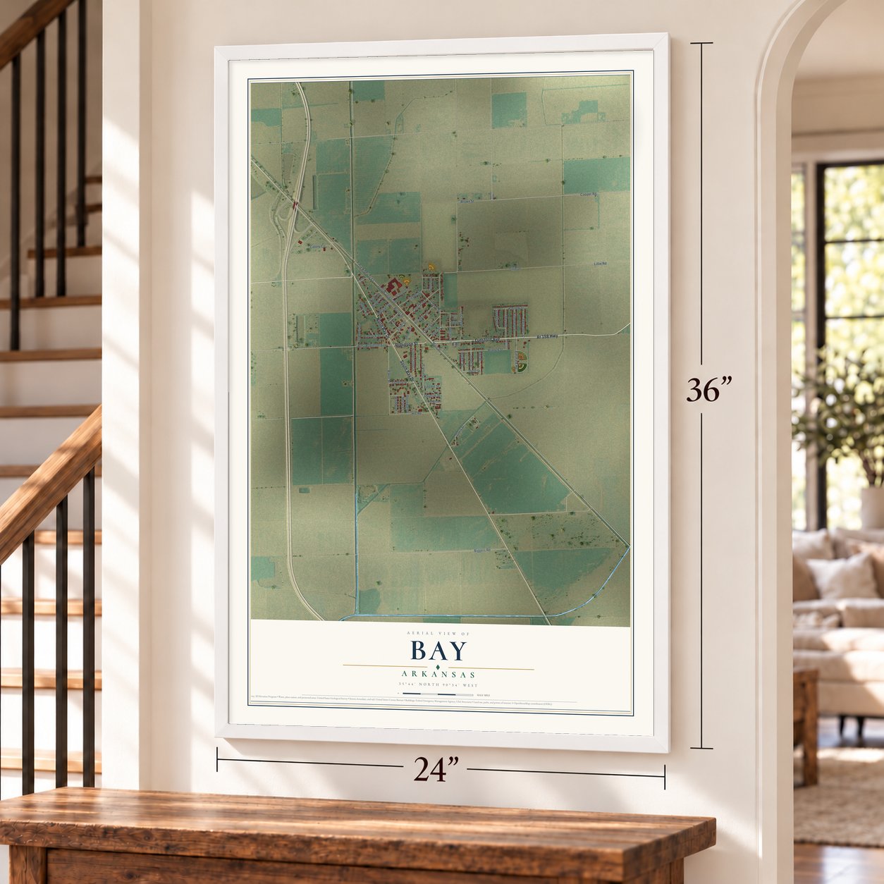 Bay, Arkansas map, 24 x 36 inch print in a white frame by a staircase