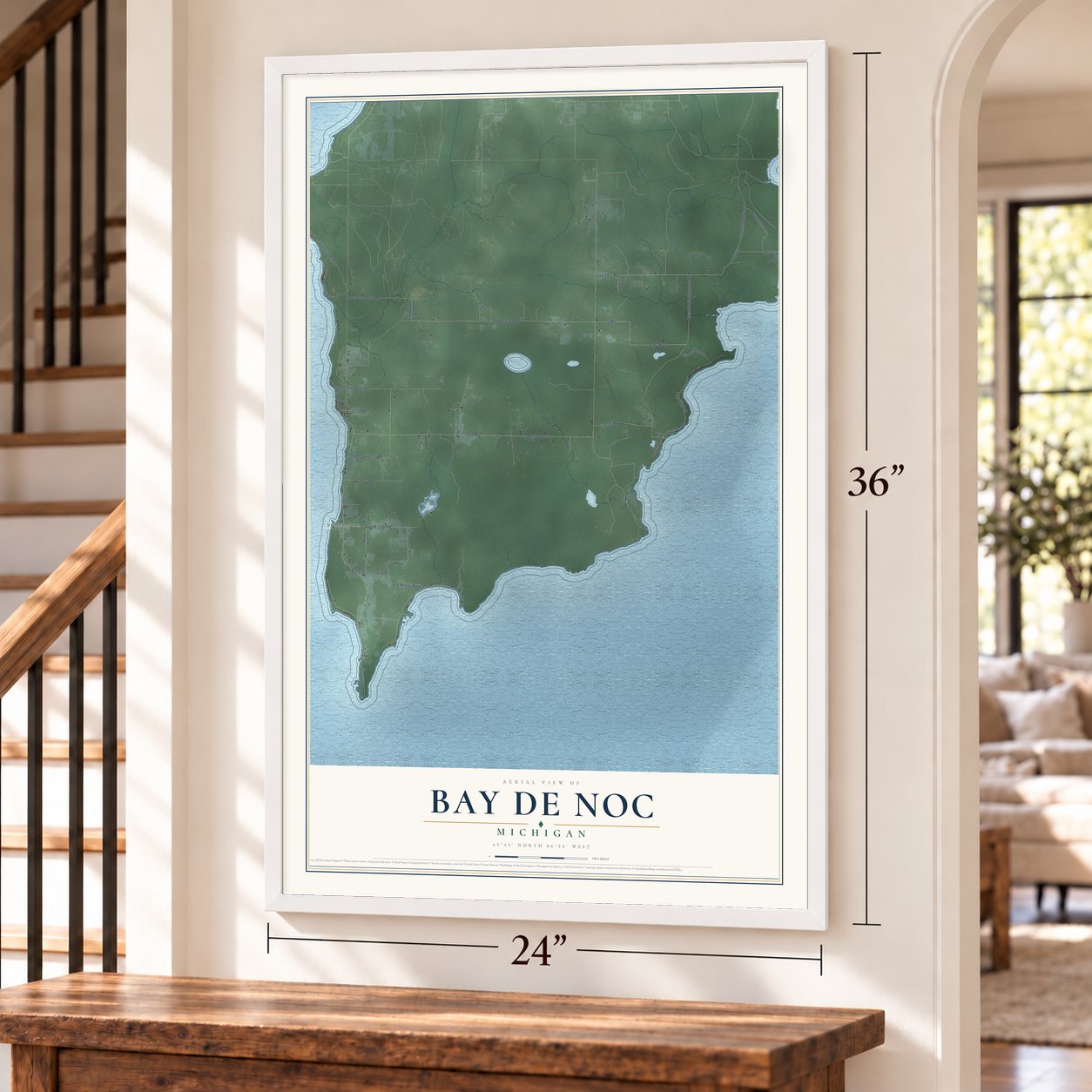 Bay de Noc, Michigan map, 24 x 36 inch print in a white frame by a staircase