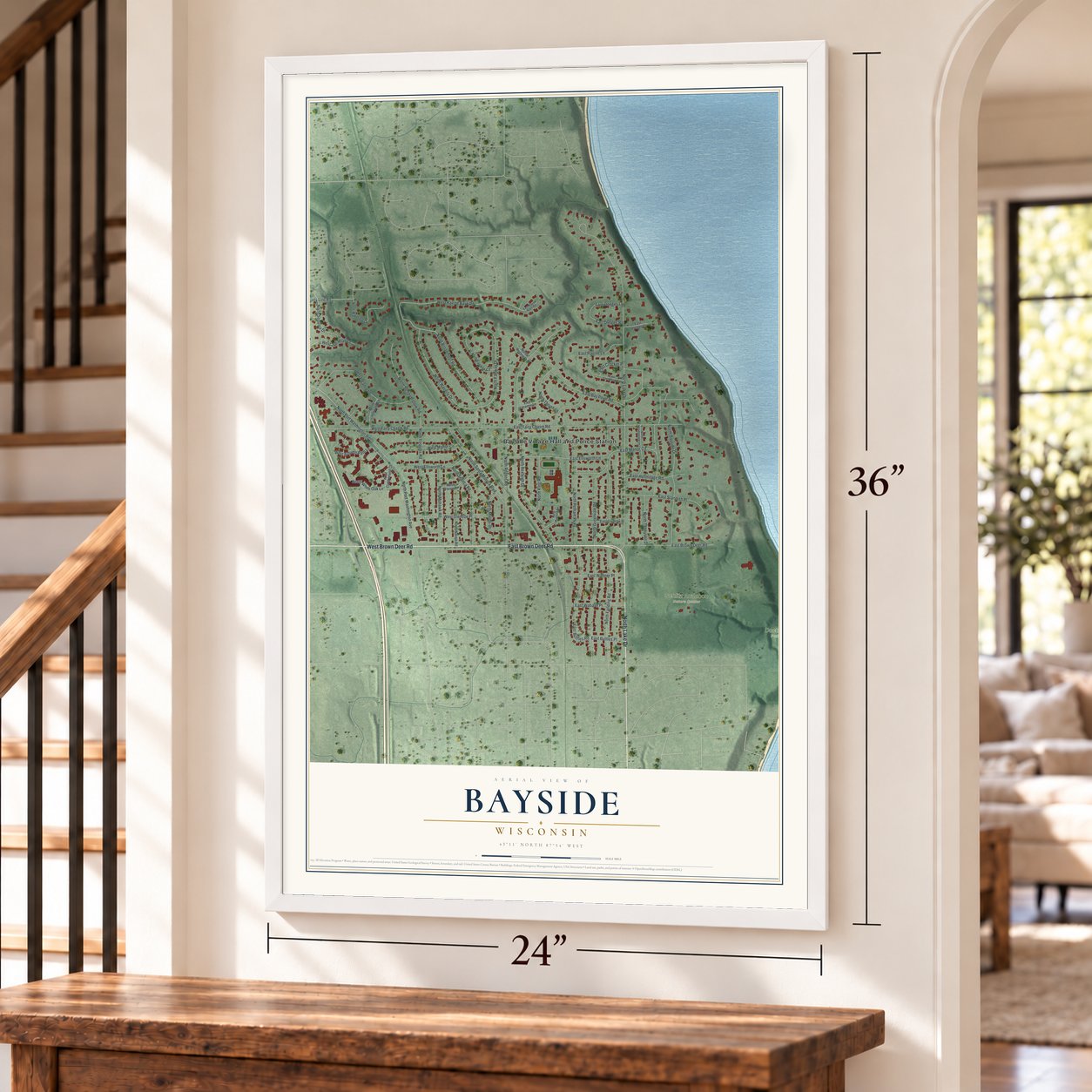 Bayside, Wisconsin map, 24 x 36 inch print in a white frame by a staircase