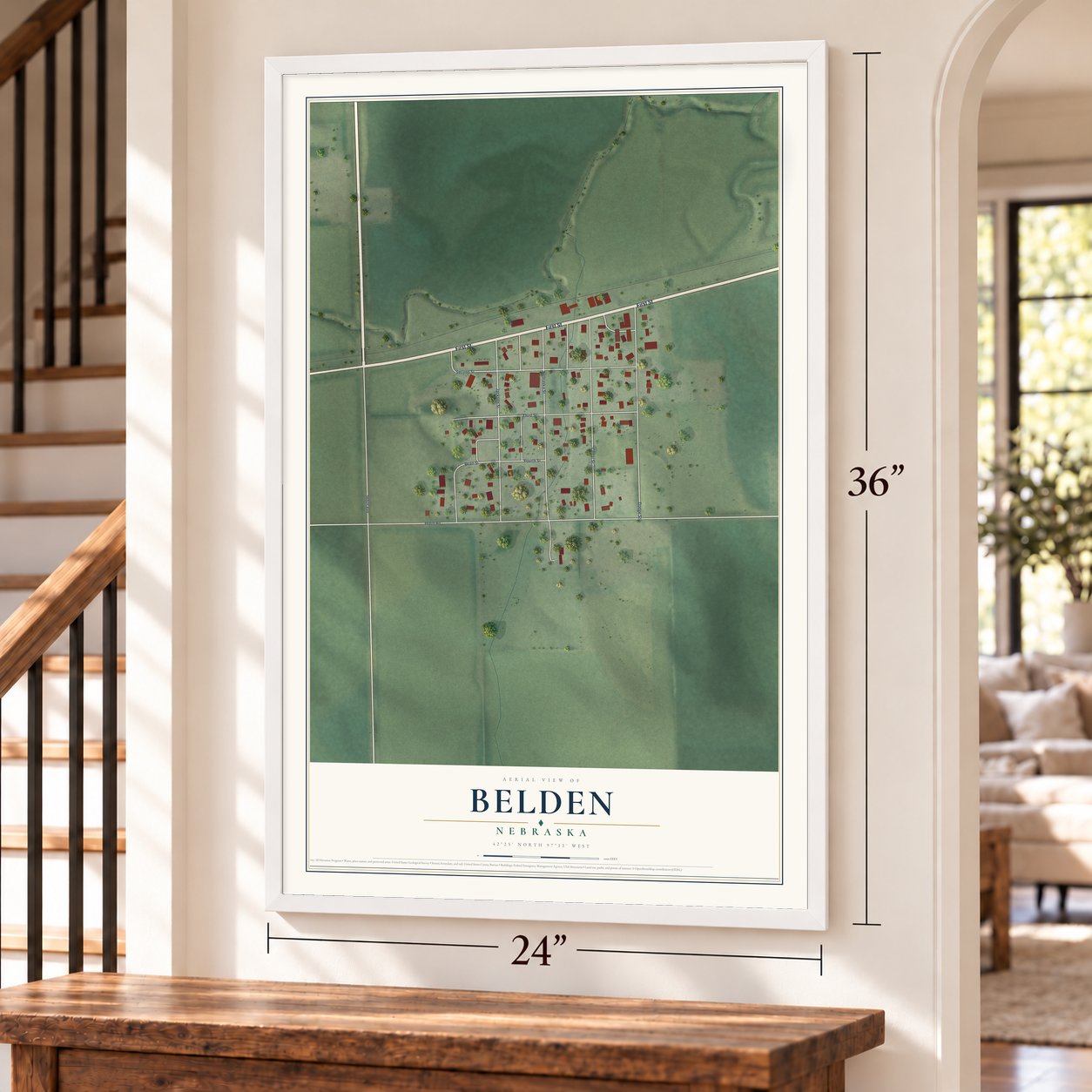 Belden, Nebraska map, 24 x 36 inch print in a white frame by a staircase