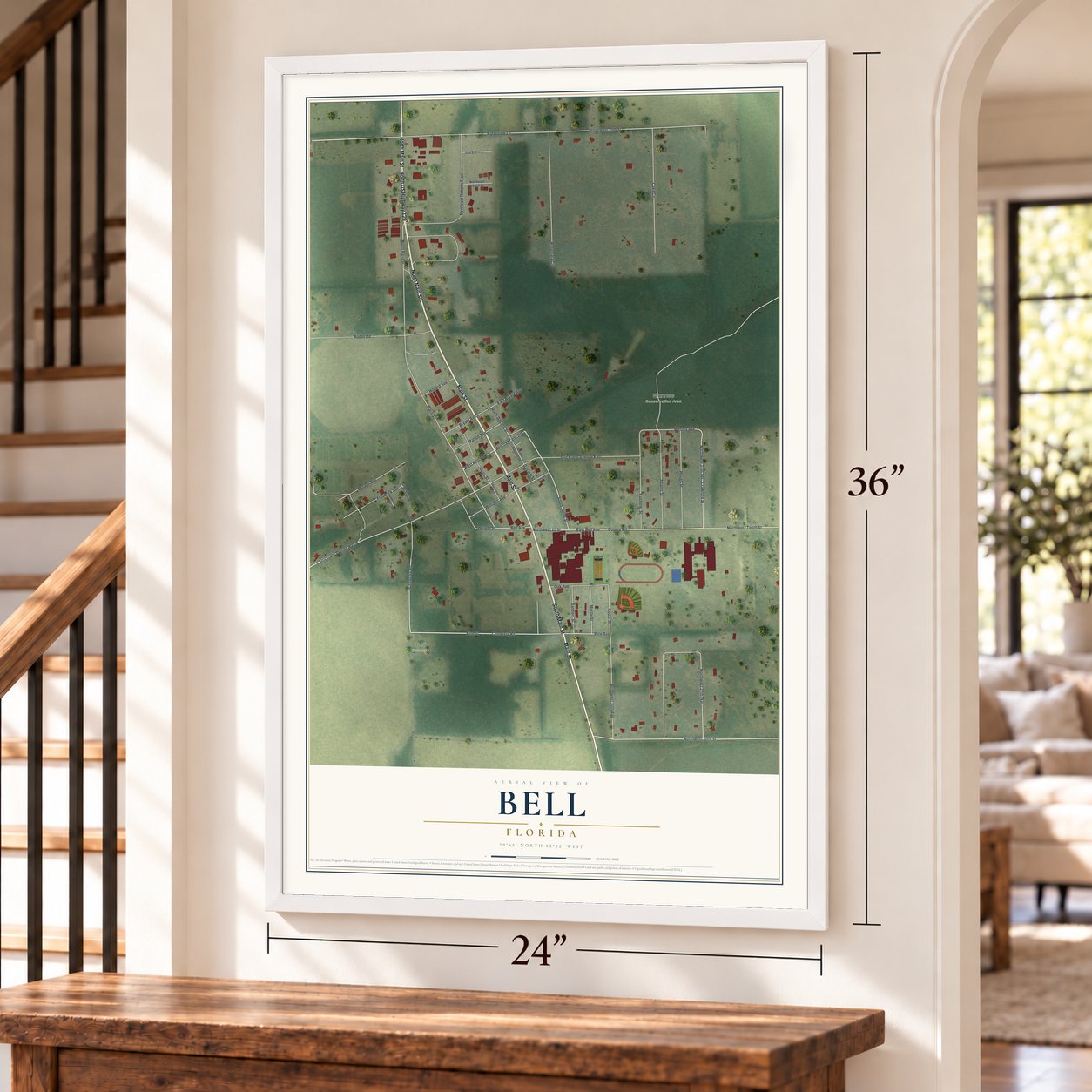 Bell, Florida map, 24 x 36 inch print in a white frame by a staircase