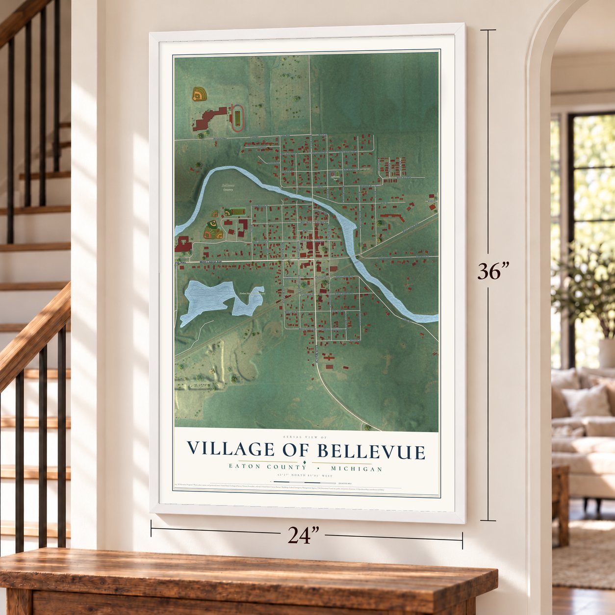 Bellevue, Michigan map, 24 x 36 inch print in a white frame by a staircase