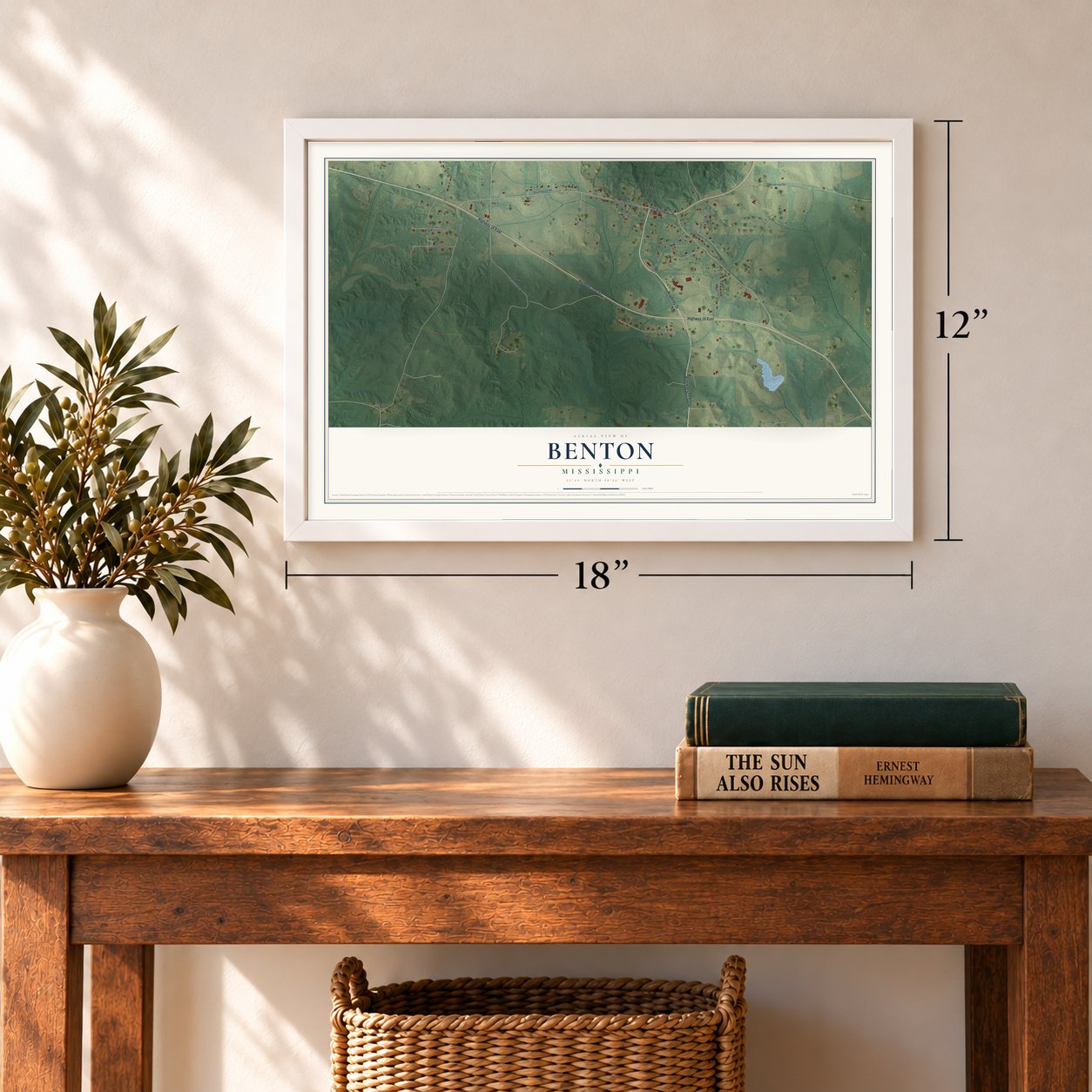 Benton, Mississippi map, 12 x 18 inch print in a white frame in an entryway