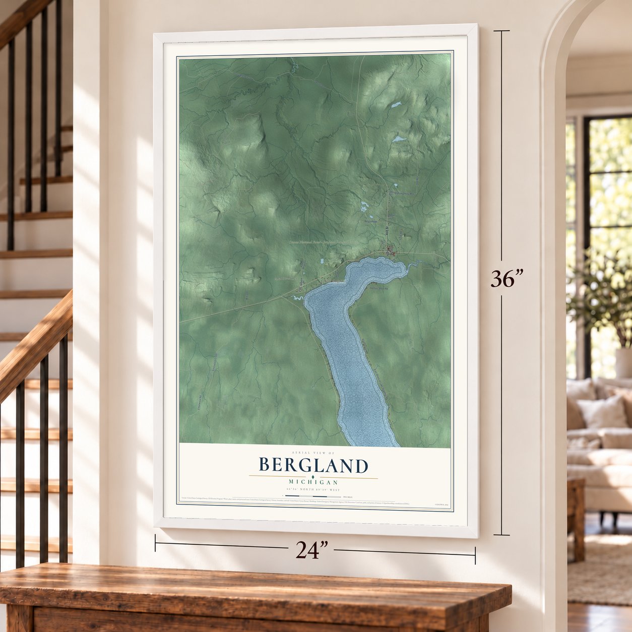 Bergland, Michigan map, 24 x 36 inch print in a white frame by a staircase