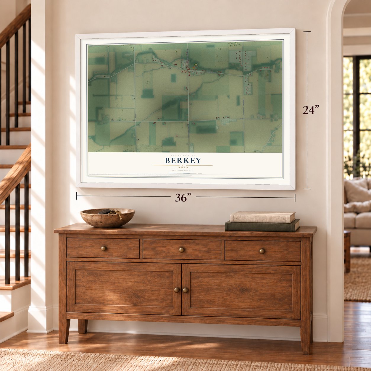Berkey, Ohio map, 24 x 36 inch print in a white frame above a dresser by a staircase